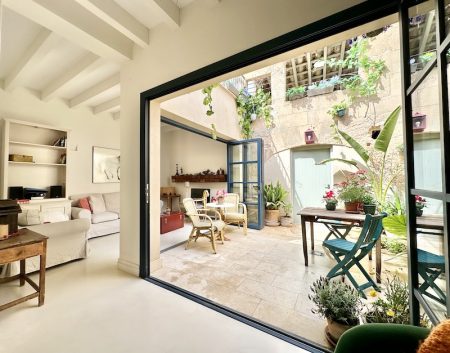 A living room with a patio and a sliding door.
